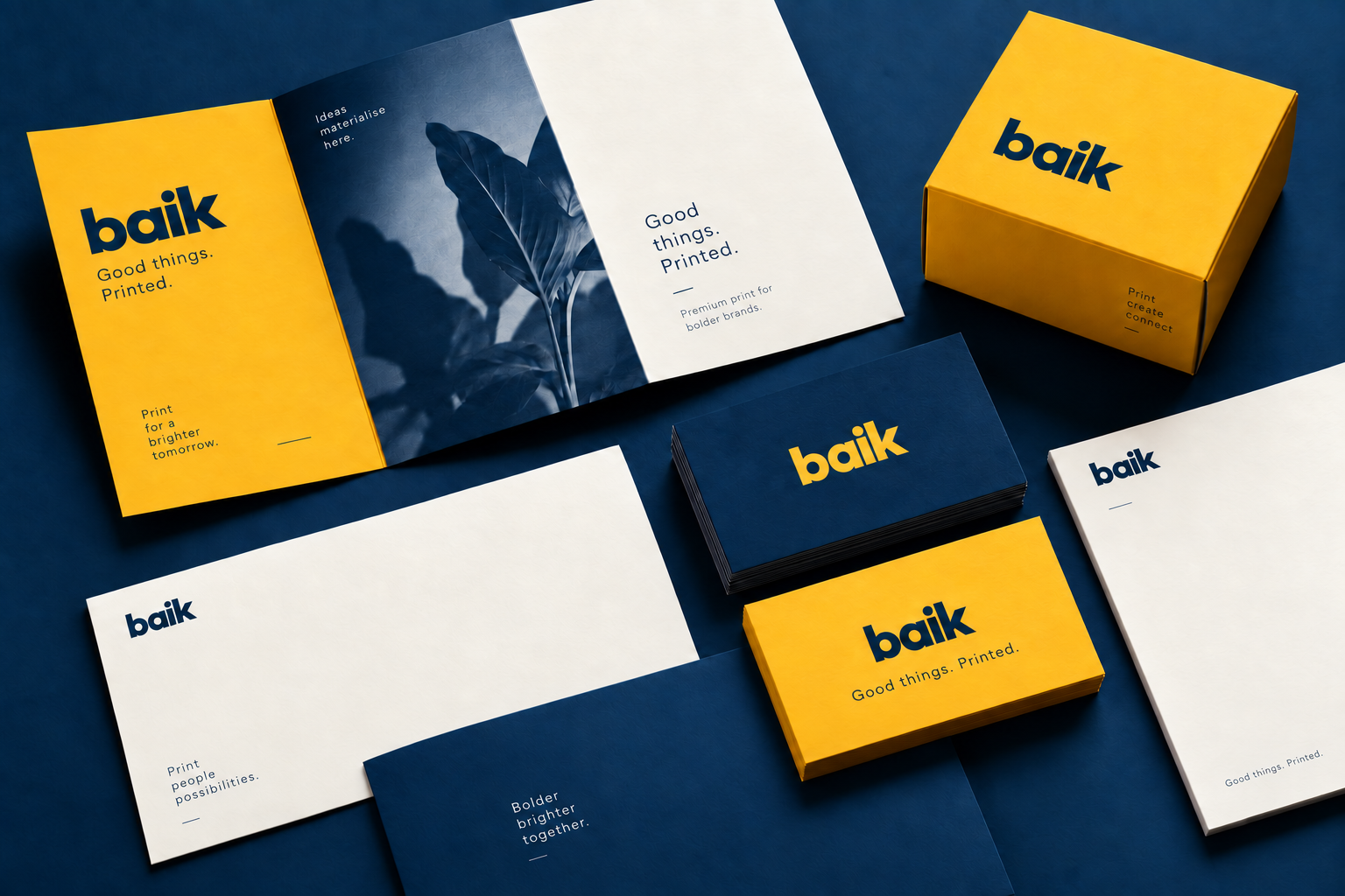 Baik branded business cards, stationery and packaging with golden yellow and navy finishes